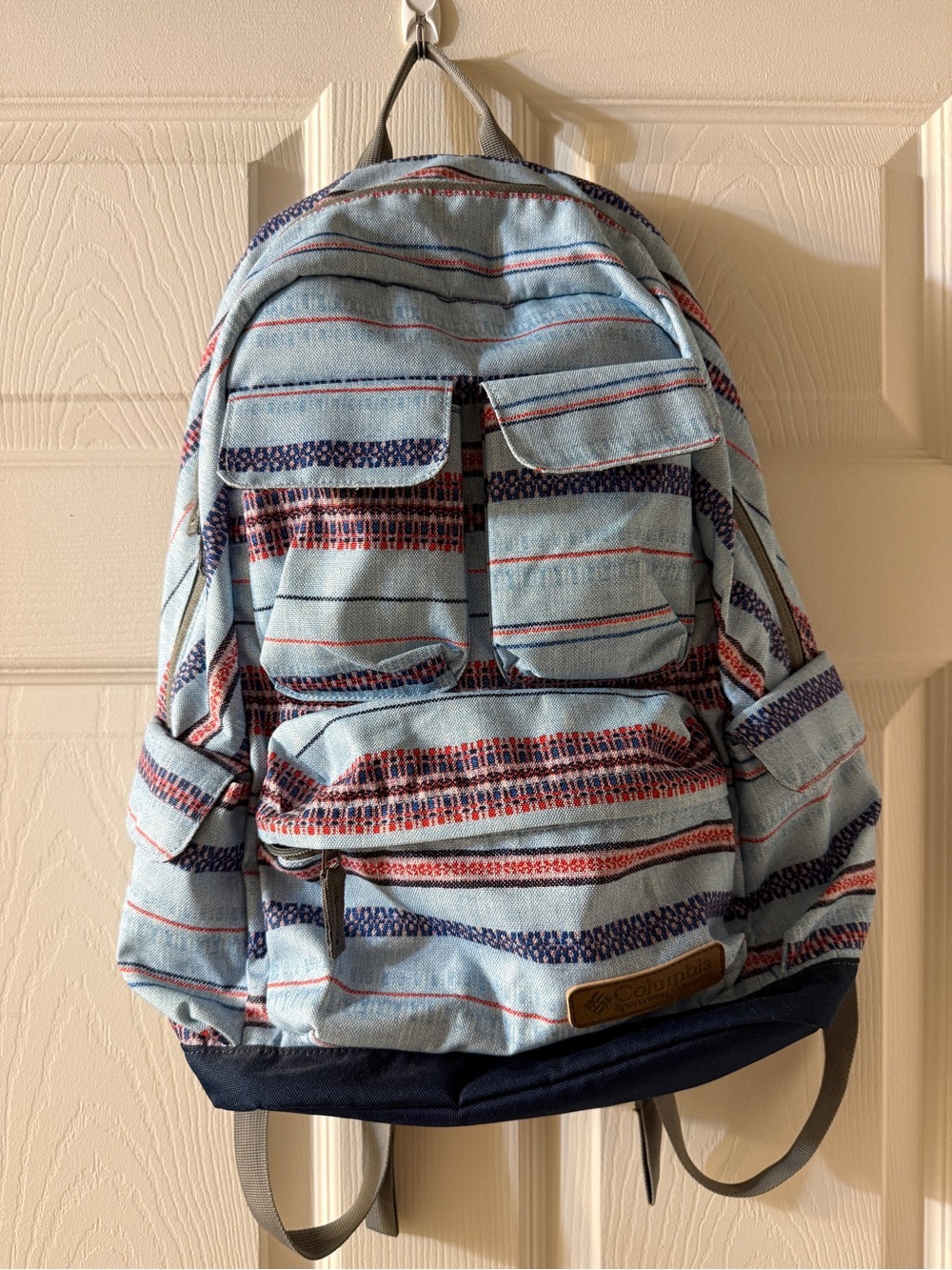 Columbia Light Blue Patterned Backpack with Navy Base and Red Accents